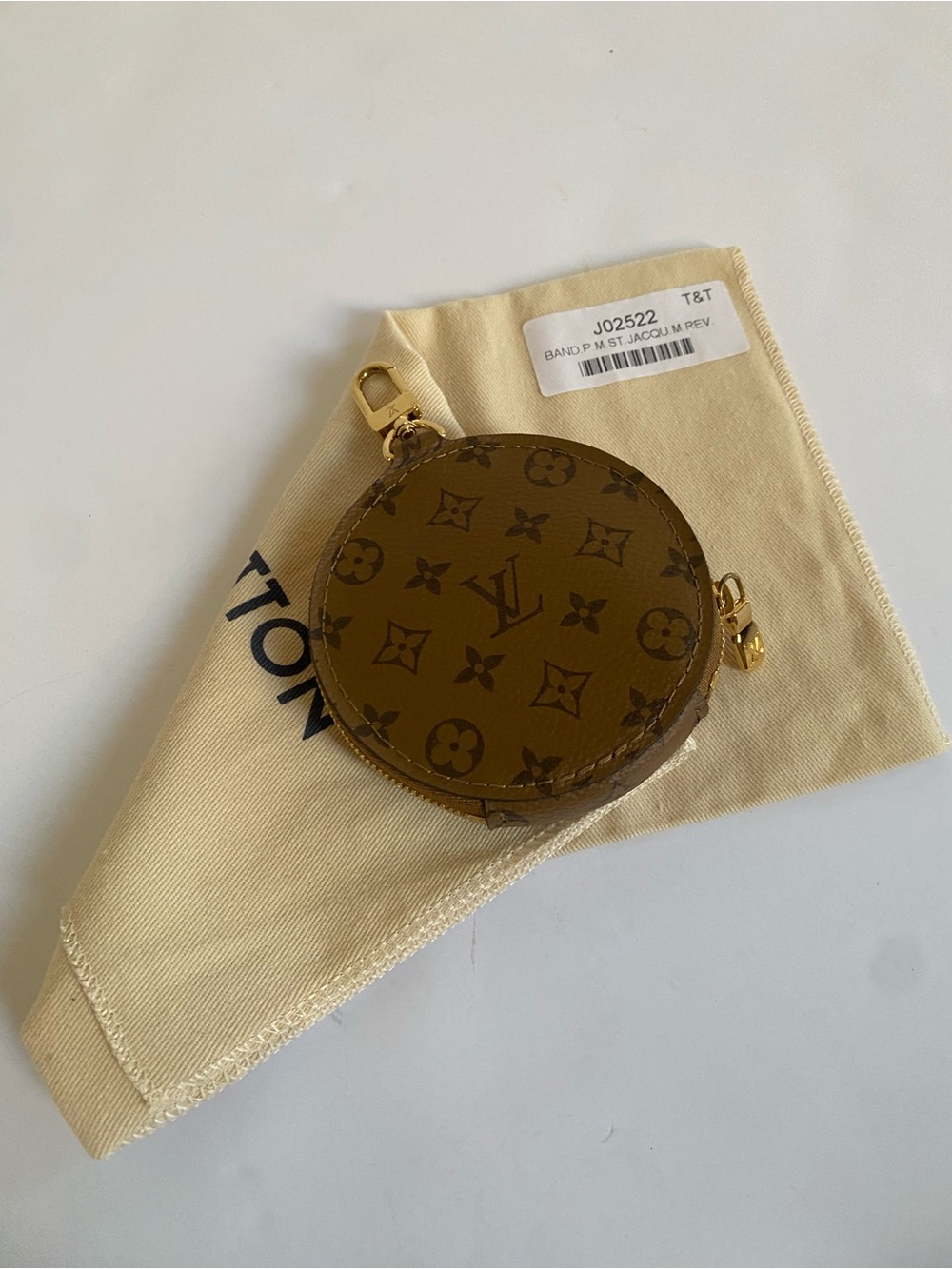 Louis Vuitton round coin purse